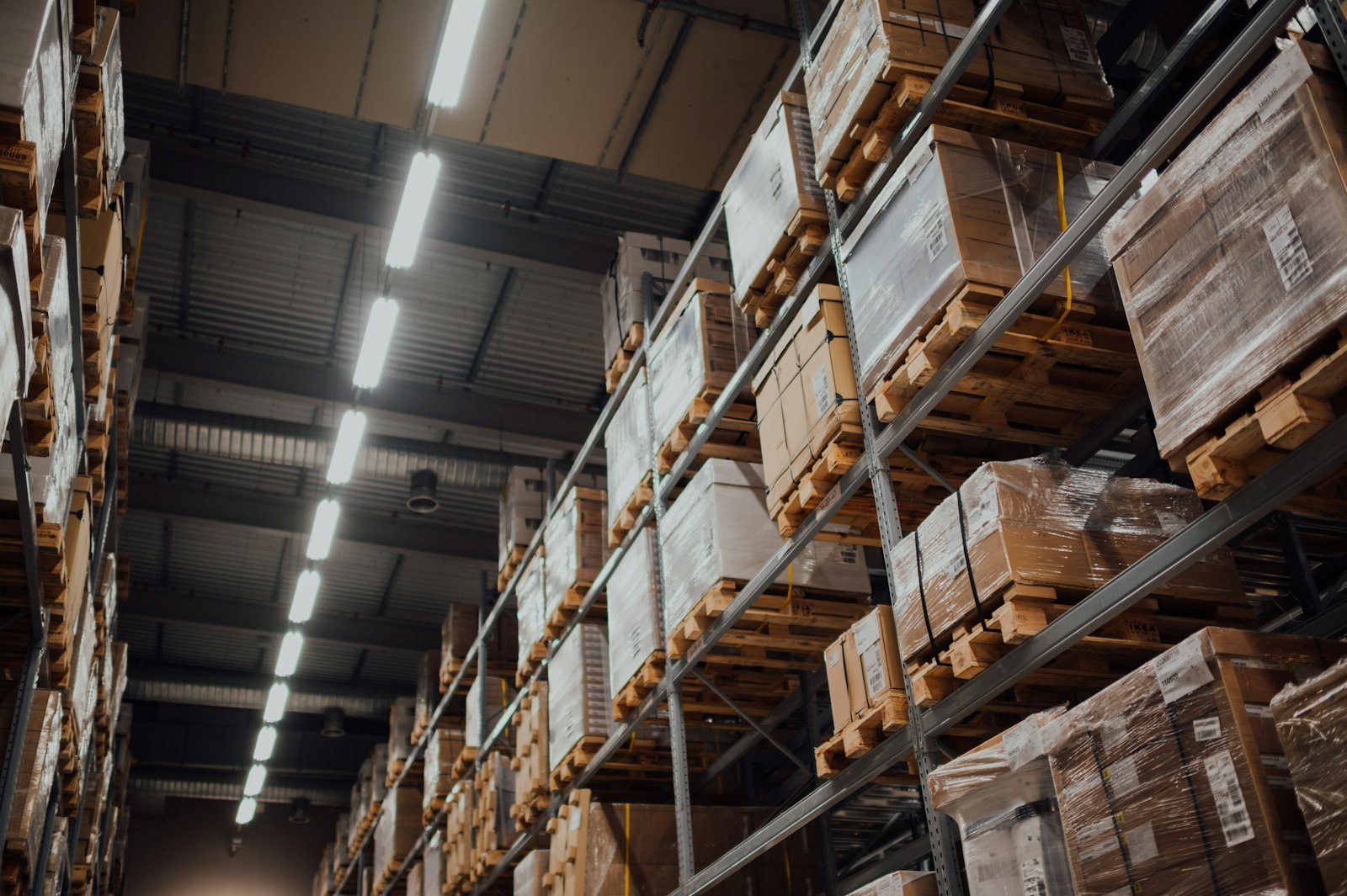 Packaged export goods stored on warehouse racks before pre-shipment inspection